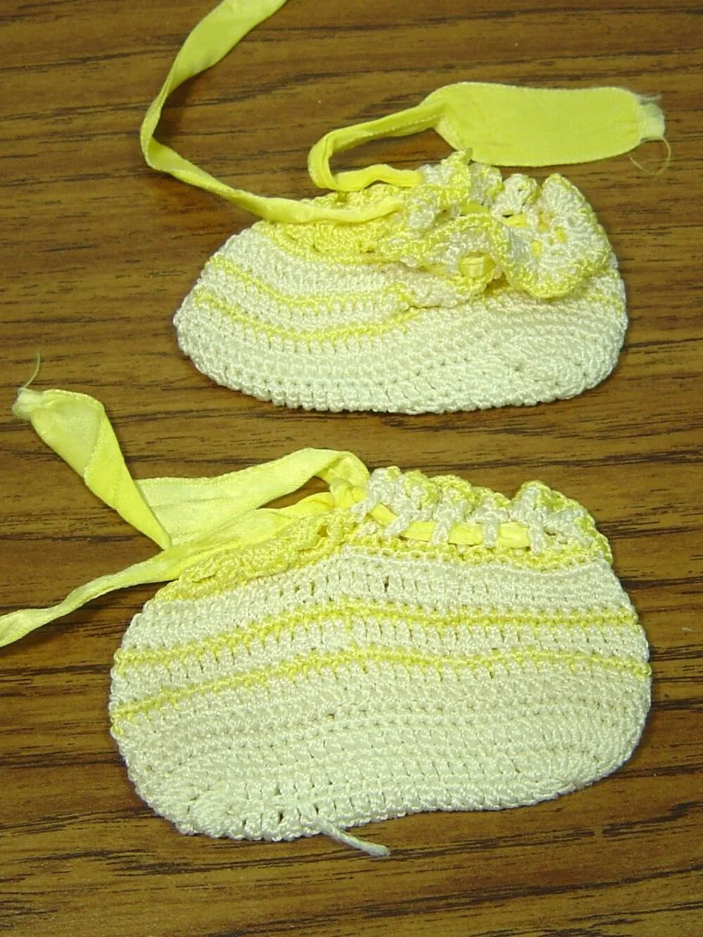 Lot of 5 vintage baby items-3 crocheted bibs, 1 pair of booties & 1 pink slip